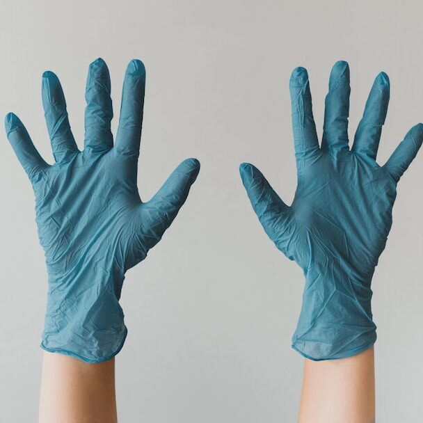 persons left hand with white background